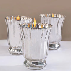 Silver Blossom - Votive Candle - Silver - Santal Blush - Set of 3, three lit mercury glass votives grouped, front view