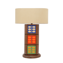 Natura Table Lamp with a beige shade and design with tiles displaying natural prints of leaves on a round base.
