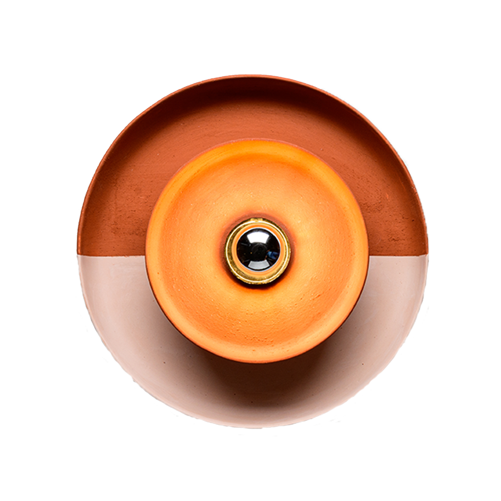 A terracotta wall sconce with a central bulb and an outer ring