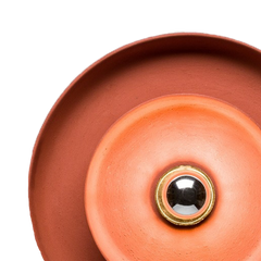 Close-up of a Terra Wall Sconce A: stone-ware terracotta Halo Wall Lamp