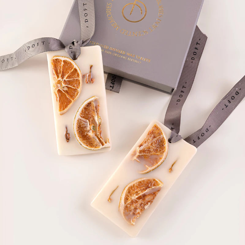 Orange Cassis - Wax Tablet - Set of 2, two tablets with dried orange slices on grey ribbons beside gift box