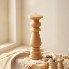 Modern - Pillar Candle - Oatmeal - Non Scented, sculptural oatmeal pillar candle on draped linen by a window