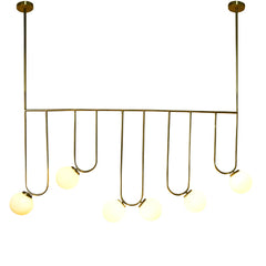 Modern pendant light with gold fixtures and glass bulbs 
