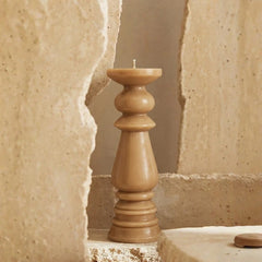 Pillar Candle Non Scented- Oatmeal, turned oatmeal pillar between textured stone slabs