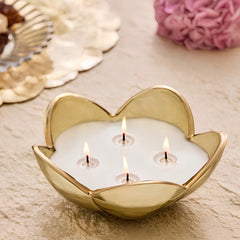 Eternal Bloom - Bowl Candle - Green - Zen Garden, close-up of lit gold lustre petal bowl on textured surface