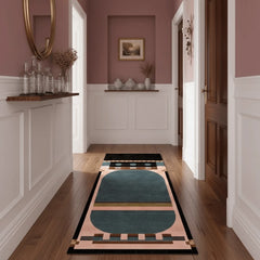 Hallway with decorative rugs on wooden floor and pink walls