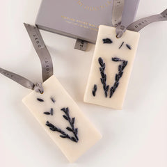 Lemongrass & Lavender - Wax Tablet - Set of 4, two lavender sprig tablets beside grey gift box