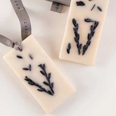 Night Jasmine & Lavender Wax Tablet, close-up of two lavender sprig tablets tied with grey ribbon