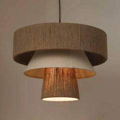 Two-layered hanging pendant light with brown and beige shades on a neutral background