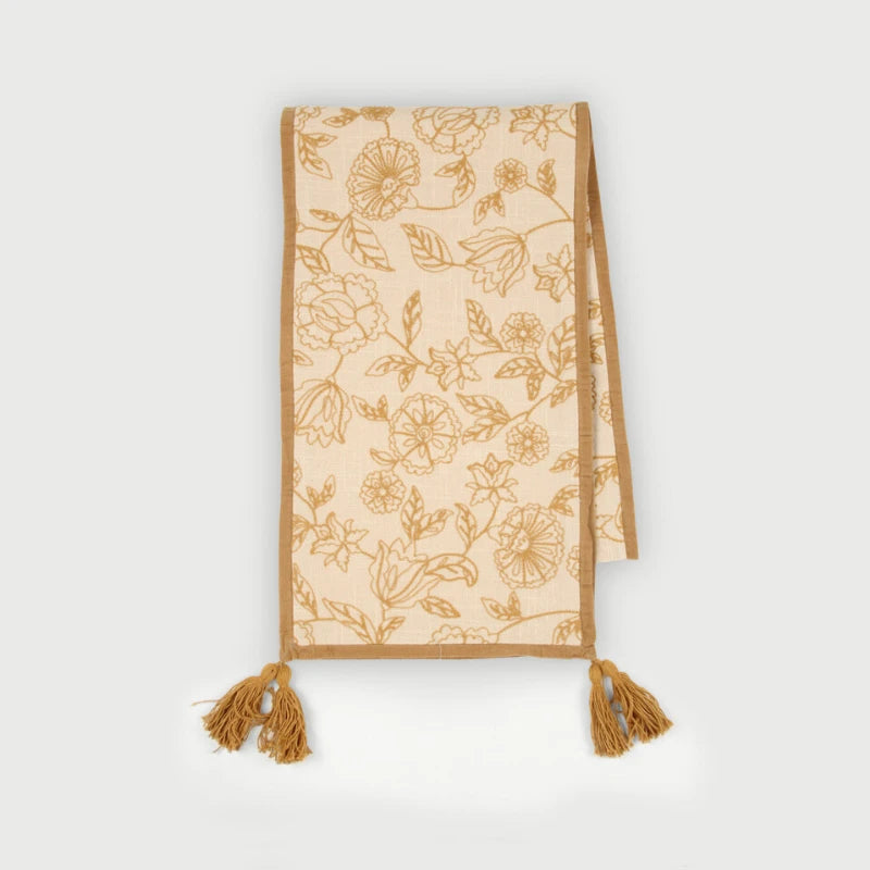 Rosabelle Chintz Ochre Table Runner laid flat, floral dori embroidery with tassels