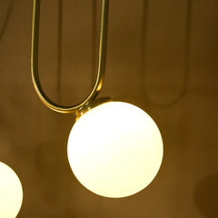 Close-up of a hanging chandelier for modern home with a warm glow