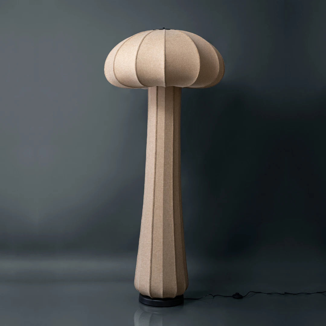 Bello Floor Lamp in beige mushroom-shaped lamp on a dark gray background
