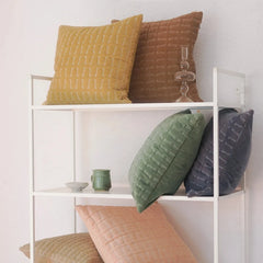 Twig Tan Brown Embroidered Velvet Cushion Cover placed.