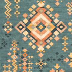 Geometric patterned rug with orange, beige, and blue colors on a teal background