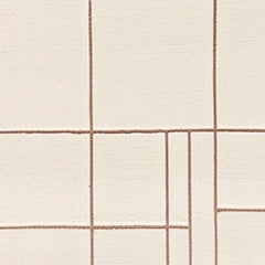 Close-up of a textured fabric with a grid pattern on a beige background