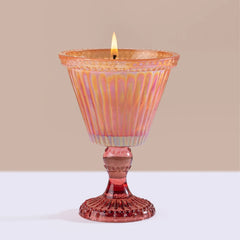 Sundae - Votive Candle - Sparkling Orchard, lit peach sundae glass candle on plain backdrop