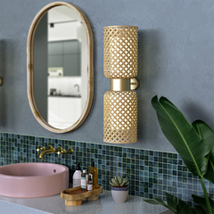 Side view of Metamorphosis Wall Lamp showing minimal profile and natural materials in contemporary decor. Mounted beside mirror in bathroom or vanity.