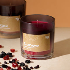 Close view of Renew Berries Vegan Scented Candle glass jar