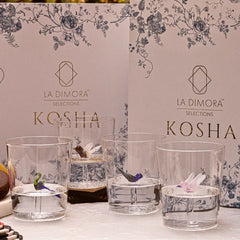 Eilen Clear glass tumblers with decorative elements with 'La Dimora Selections Kosha' branding.