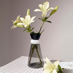 Clear Twilight Vase on a checkered tablecloth with a gray background