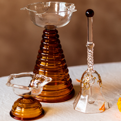 Tall Glass diya with amber ribbed bottom with short glass diya and glass bell