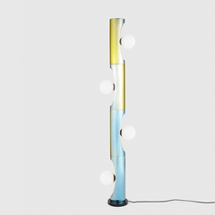 Notch floor lamp with a rainbow-colored design, featuring a series of round opal glass on a plated steel pole.