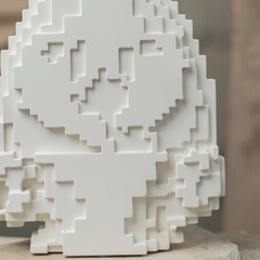 Unique mirage vase with a pixelated mosaic design.