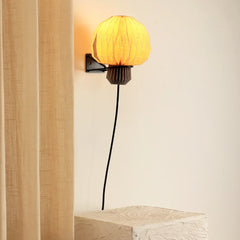 Side view of origami wall light on bedroom wall