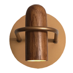 Close-up of wood grain and shell-inspired form of wall sconce