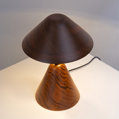 Nuit Table Lamp with a dark brown wooden shade top view.