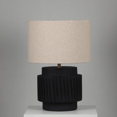 Modern Table lamp with black ribbed terracotta base and beige lampshade