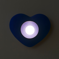 Designer heart wall sconce in neutral finish for bedroom ambient lighting