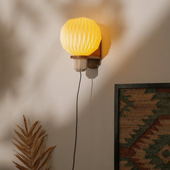 Aura Pleat linen wall sconce light on wall