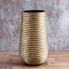 Bhrama Vase made of aluminum in gold finish and textured lines