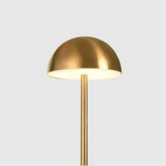 Mushroom Gold floor lamp with a dome-shaped shade 