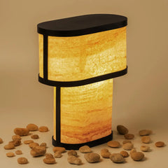 Decorative Niko Table Lamp made of Teak Wood Sandstone showing warm ambient light