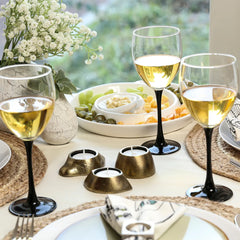 Unique design three Leshya Tea Light Holders made of Aluminium placed on a table