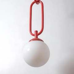 Close view of Chain link red ceiling light with a white glass diffuser at the bottom.