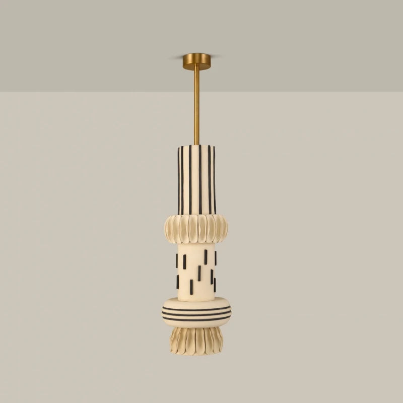 Totem Pendant Light II, stacked white ceramic tiers with black stripes on brass stem, full view