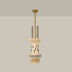 Totem Pendant Light II, stacked white ceramic tiers with black stripes on brass stem, full view