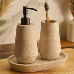 Otel Travertine Dispenser Set - Close-Up with Bamboo Toothbrush, Porous Travertine Texture