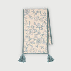 Rosabelle Chintz Teal Table Runner laid flat, floral patterned embroidery with microvelvet borders & tassels  