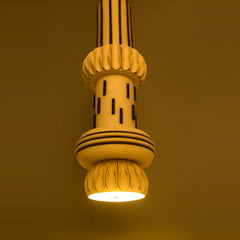 Totem Pendant Light II close-up of ribbed ceramic collars and black dash detailing, lit