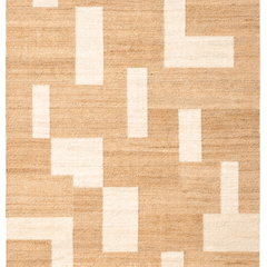 Beige and white geometric patterned rug