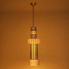 Totem Pendant Light III lit with warm glow, full view