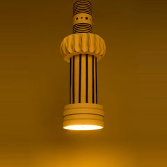 Totem Pendant Light III close-up of ribbed collar, black striped body and glowing base