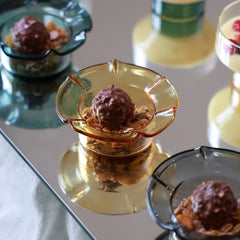 PETAL - Mini Glass Server in yellow – chocolate truffle on dry fruits, with teal and clear black servers on a mirror tray