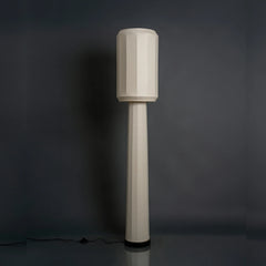 Domus Slim Floor Lamp full view showing slender silhouette in fabric and metal