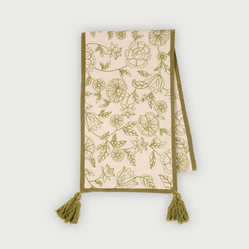 Rosabelle Chintz Olive Table Runner laid flat, floral dori embroidery with tassels