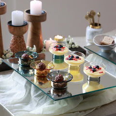 PETAL - Mini Glass Server – teal, yellow and clear black servers with chocolate truffles on a mirrored dessert table